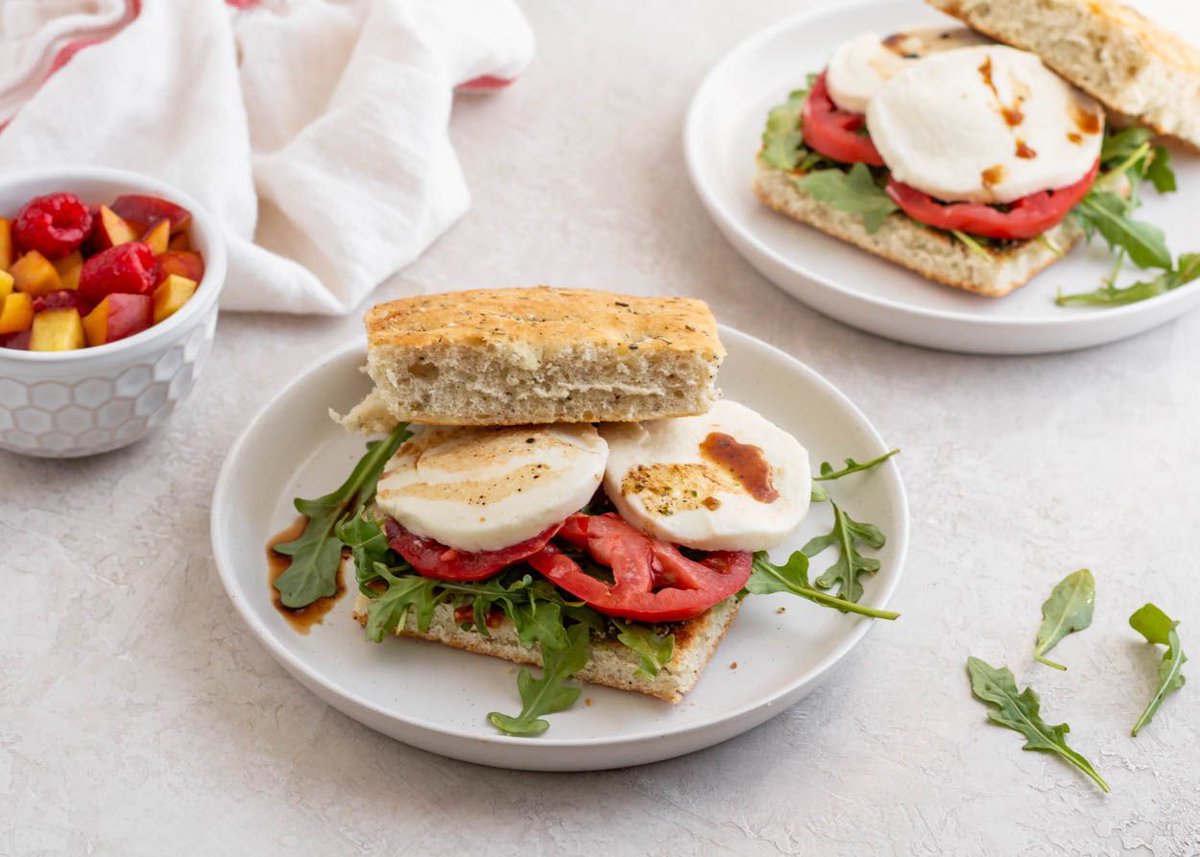 Focaccia Caprese Sandwich | A tender focaccia loaf filled with fresh vegetables and cheese is truly a meal to remember. If you've never made sandwiches on focaccia, you'll want to add it to your regular rotation. buff.ly/46koIBS #mealplan