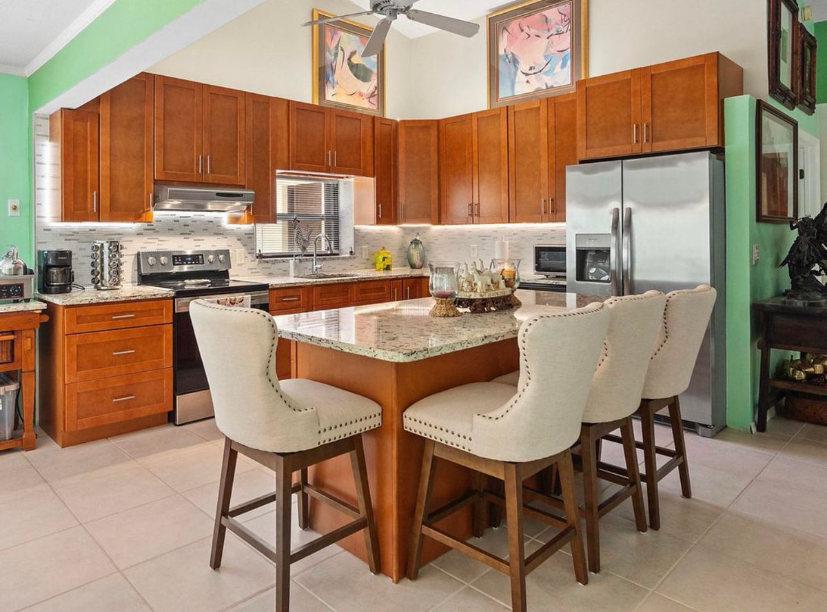 BarbreGage's tweet photo. Discover your dream home at 4 Palmetto Dr, Sewall's Point, FL! 🌴✨ This coastal retreat features a 2022 kitchen renovation, outdoor oasis with tropical landscape, solar system, screened-in pool, &amp; more. Prime location near top schools &amp; new Brightline station 863-447-0178 🏡 https://t.co/gbLeDhw8CE