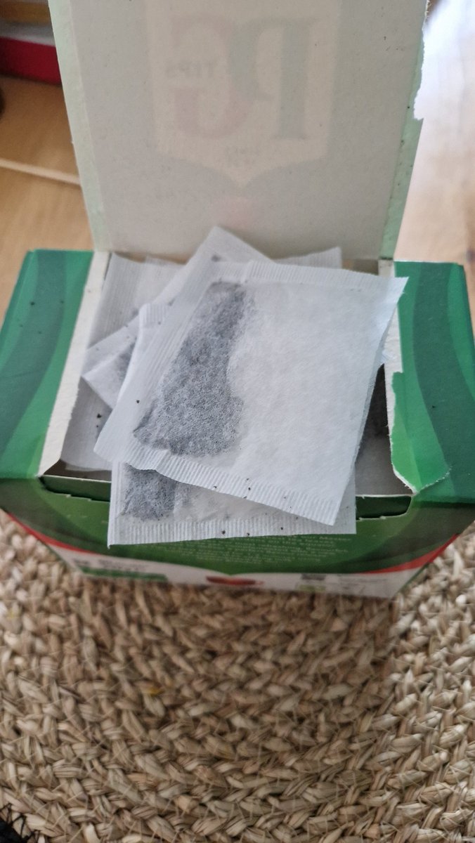 AbzAziz's tweet photo. @PGtips quality control went out the window on this batch. Opened the box to find half the teabags open. Can't even return them to the shop. 80 teabag box and only 40 are usable! #Refund #Poorshow  #BringBackThePyramidBags https://t.co/sN6YQug8pD
