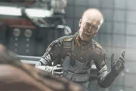 Gen_Deathshead's tweet photo. "Dear people of the world. This is general Wilhelm Strasse speaking.

Rumors of my death or even mutilation have been greately exaggerated. I am still alive and my resolve to crush the Rebel elements has never been stronger.

Welcome... to my new era." https://t.co/4eu9SF5aCR