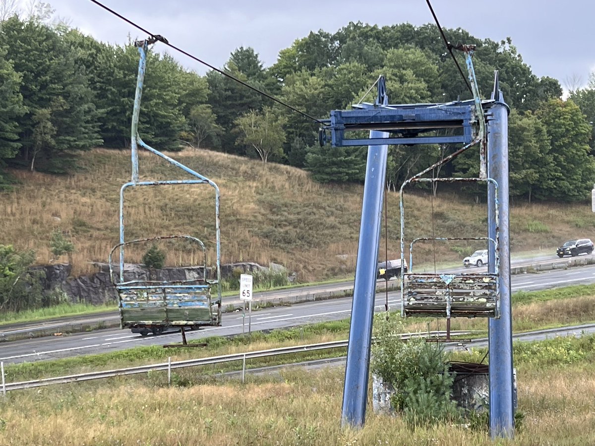 The old double chair you see from NY17 is more billboard than machine: Holiday Mountain demolished the bottom of the chair to make room for tubing last year, and tied the haul rope to keep the chairs in place. Plans are to eventually replace the lift &amp; re-open the terrain.