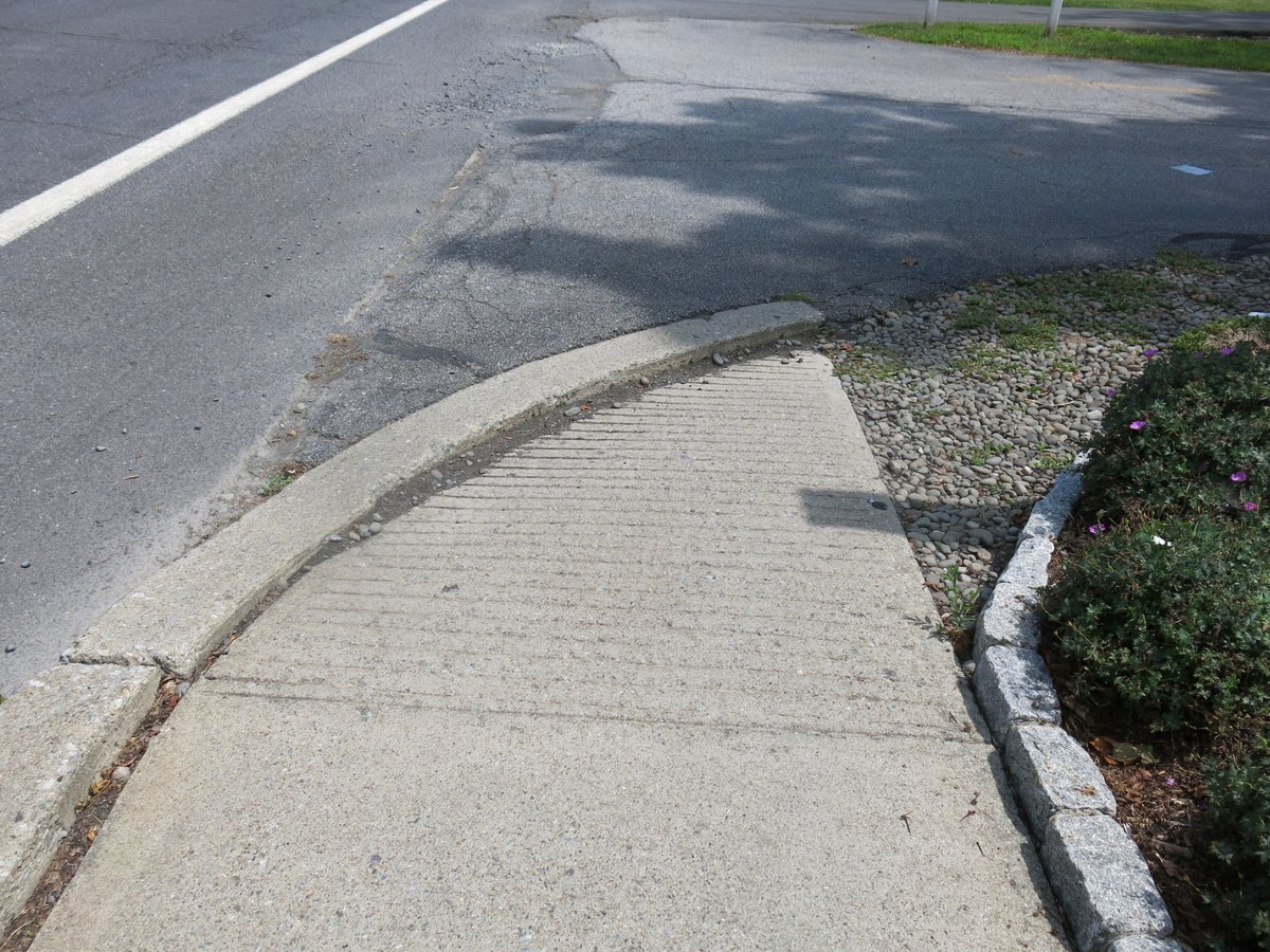 BikeTarrytown's tweet photo. Yeow! The sidewalks in New Paltz are lousy. Narrow. Uneven. Disintegrated. Sad that this lovely village makes walking/wheelchairing so unpleasant. #ADAFail /cc @AlexandriaPaltz https://t.co/xkKypAnqoq