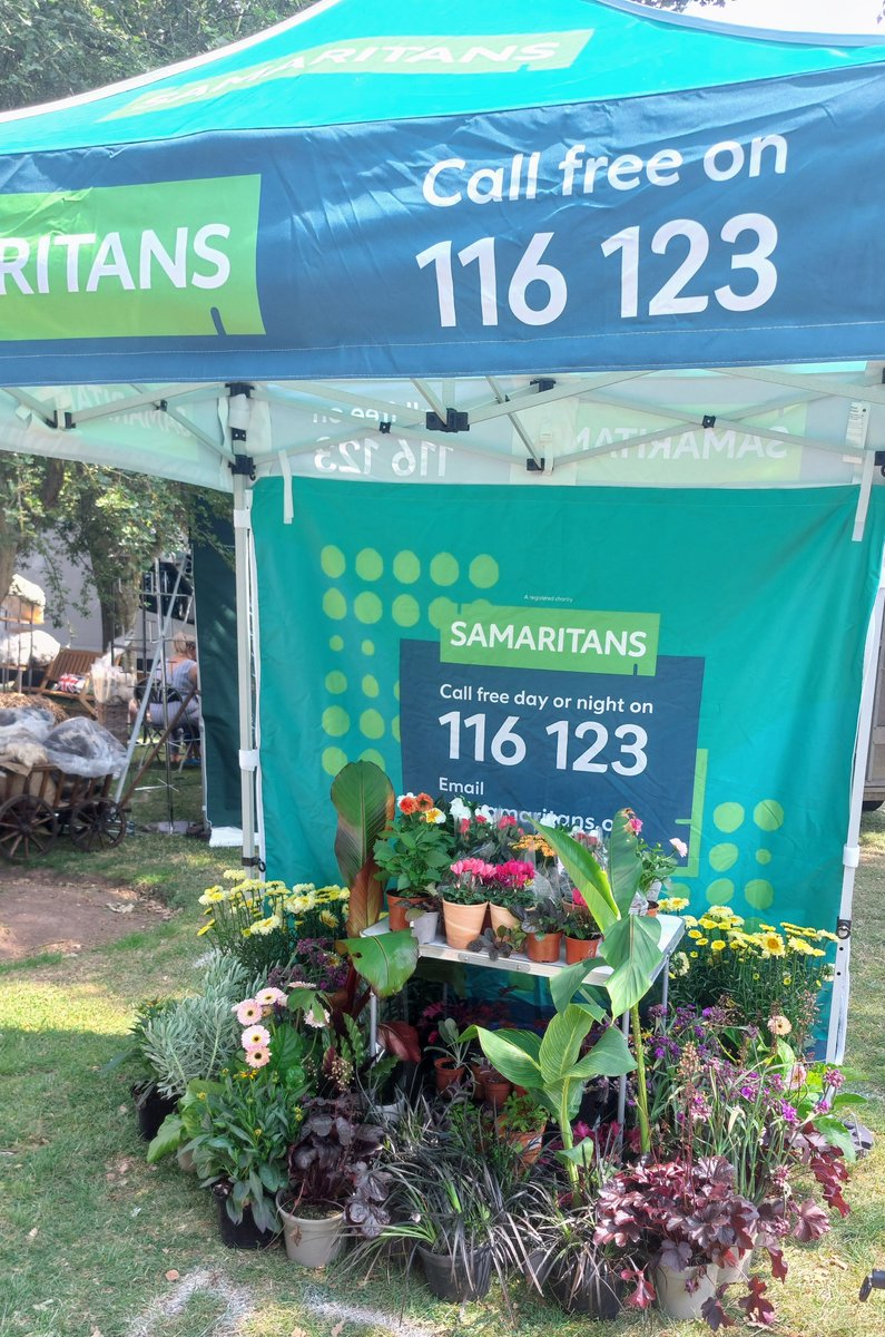 SamaritansTau's tweet photo. We're looking forward to raising awareness of our important work @TauntonFS this week.  Our new gazebo looks great and we have been blessed with many generous plant donations to festoon our stall.  We hope to meet lots of you in Vivary Park.🌻💐 https://t.co/G7OZUevHIq