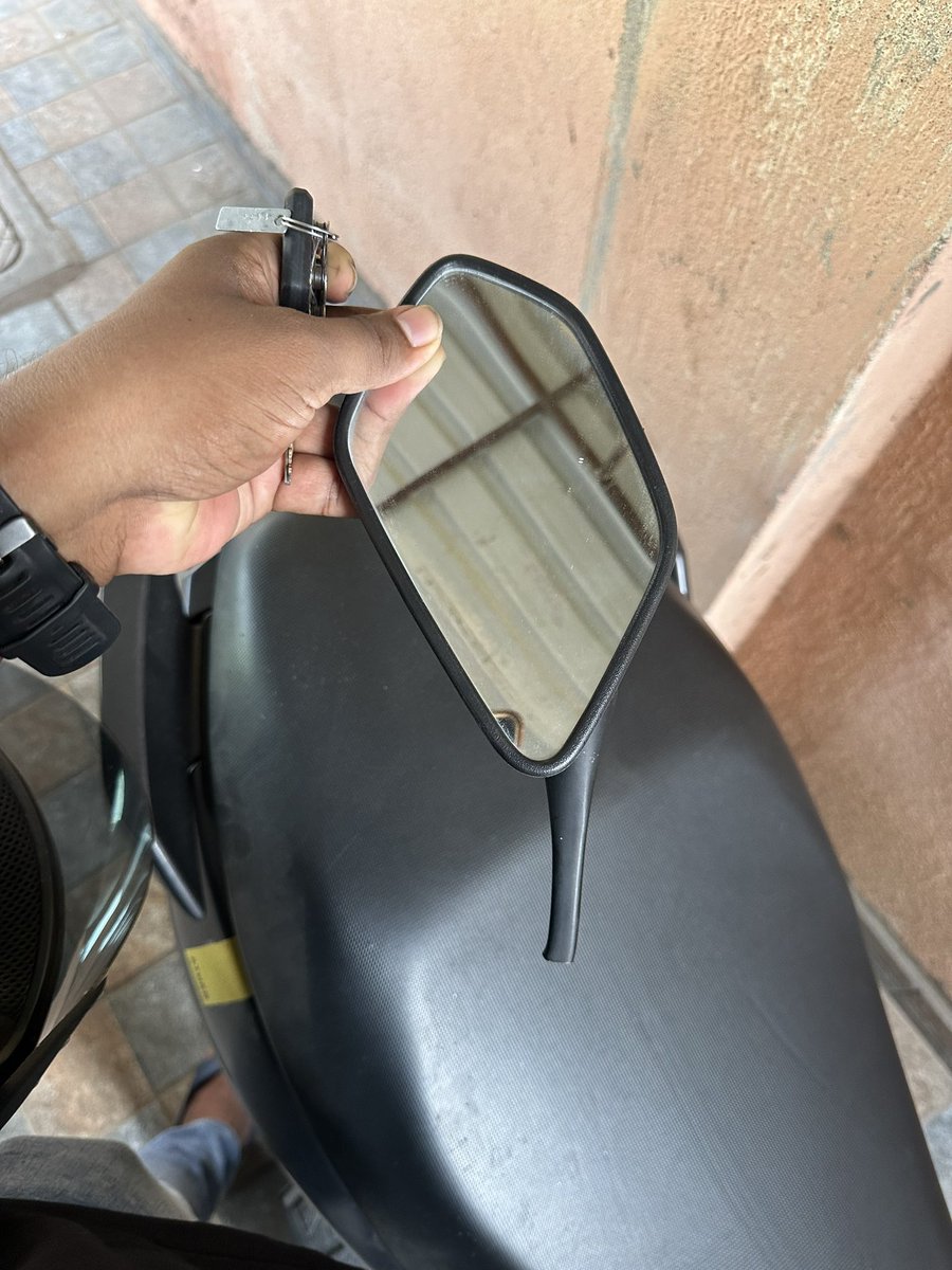 harishthoppey's tweet photo. @AtherEnergy My Ather vehicle's mirror was damaged when a passerby brushed against it, as seen in CCTV footage. It's concerning this is categorized as mishandling. Can you clarify why, given the evidence? Also, worried about the vehicle’s  durability. @AUTONDTV  @tarunsmehta https://t.co/2swy79GcUx