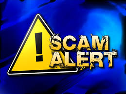 Blue background with yellow triangular caution symbol with an explanation mark in the center//SCAM ALERT