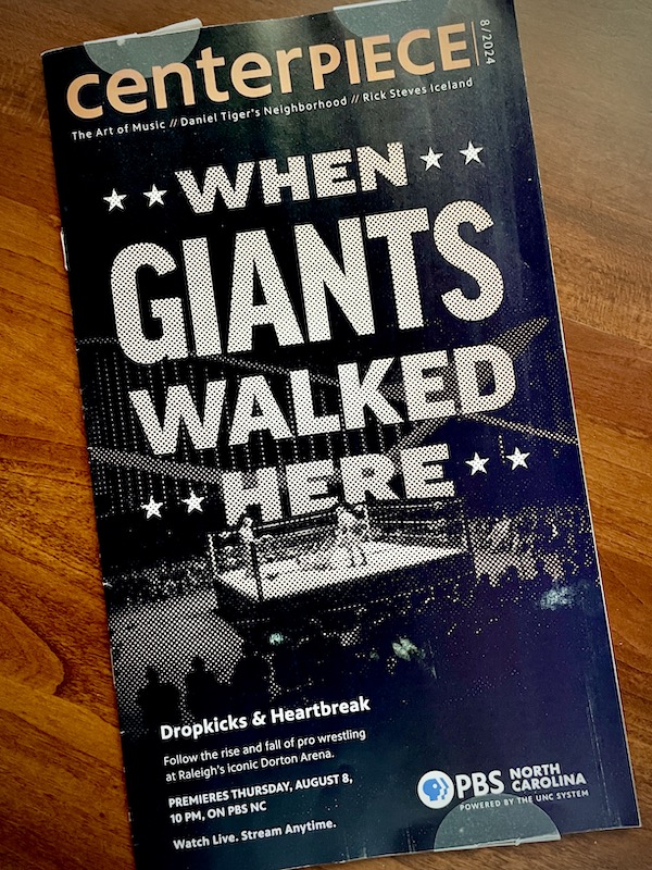 magateway's tweet photo. Nice to see PBS's Centerpiece program guide feature the upcoming documentary on wrestling at Raleigh's Dorton Arena on its cover. "When Giants Walked Here" premiers Aug. 8 at 10 PM on PBS-NC and everywhere on the PBS Passport app. @CliffBumgardner's project looks great! https://t.co/NML4voihzx