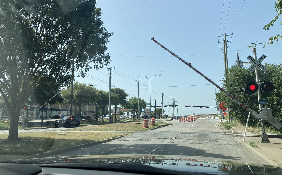 Rowlett_PD's tweet image. Traffic Alert: The railroad crossing arms on the 1800 block of Dalrock Rd. are malfunctioning. While lanes remain open, traffic flow is affected. RPD Officers are on site assisting with traffic management. DGNO has been notified of this issue.

If possible, please avoid this area