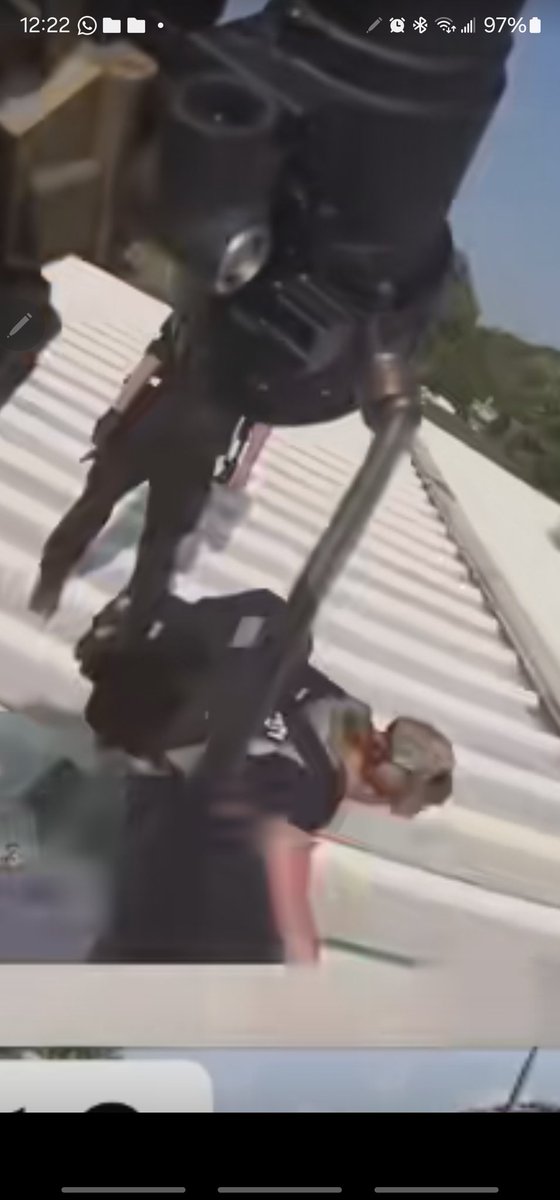 AronGonzalez77's tweet photo. @TuckerCarlson 
The people who recorded this footage on the roof were hiding behind the crane and didn't come out to protect @realDonaldTrump until after he left. Why did they go straight to the shooter and tamper with evidence before CSI showed up?
@SenJohnKennedy
@HawleyMO https://t.co/GUVaChUY4X