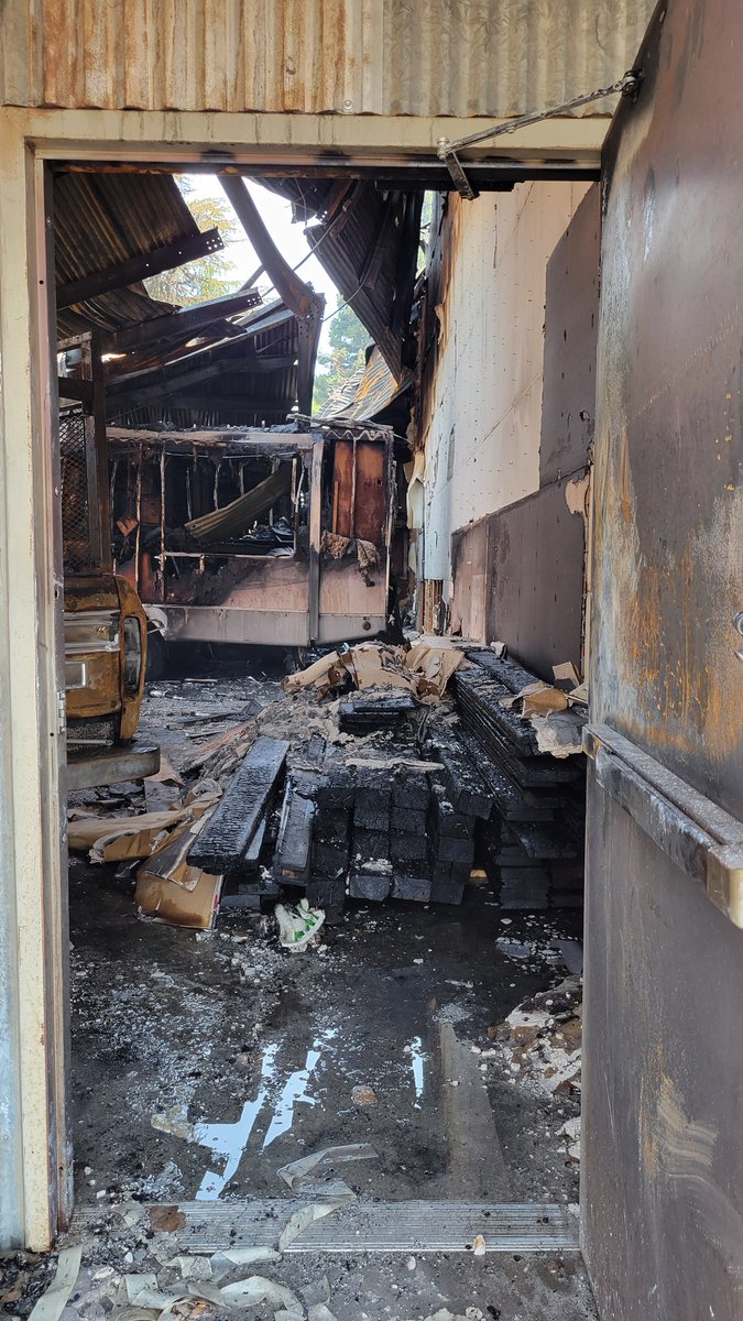 CALFIRE_ButteCo's tweet photo. Crews have contained a structure fire in Gridley. A warehouse at Magnolia and Virginia caught fire this morning and destroyed multiple vehicles. One possible civilian injury. Flames were knocked down within 45 minutes. #GraceFire https://t.co/sUkxTHZWZd
