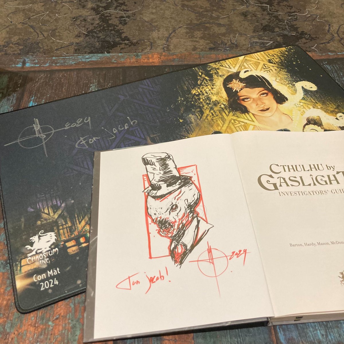 How cool is this? - if you ask staff artist <a href="/LoicMuzy/">Loïc Muzy</a> to sign your #CallOfCthulhu and #Pendragon books, you don't just get a signature...
Over the course of #GenCon2024 you can find Loïc in our special Call of Cthulhu event room, #134 in the Hoosier Corridor.