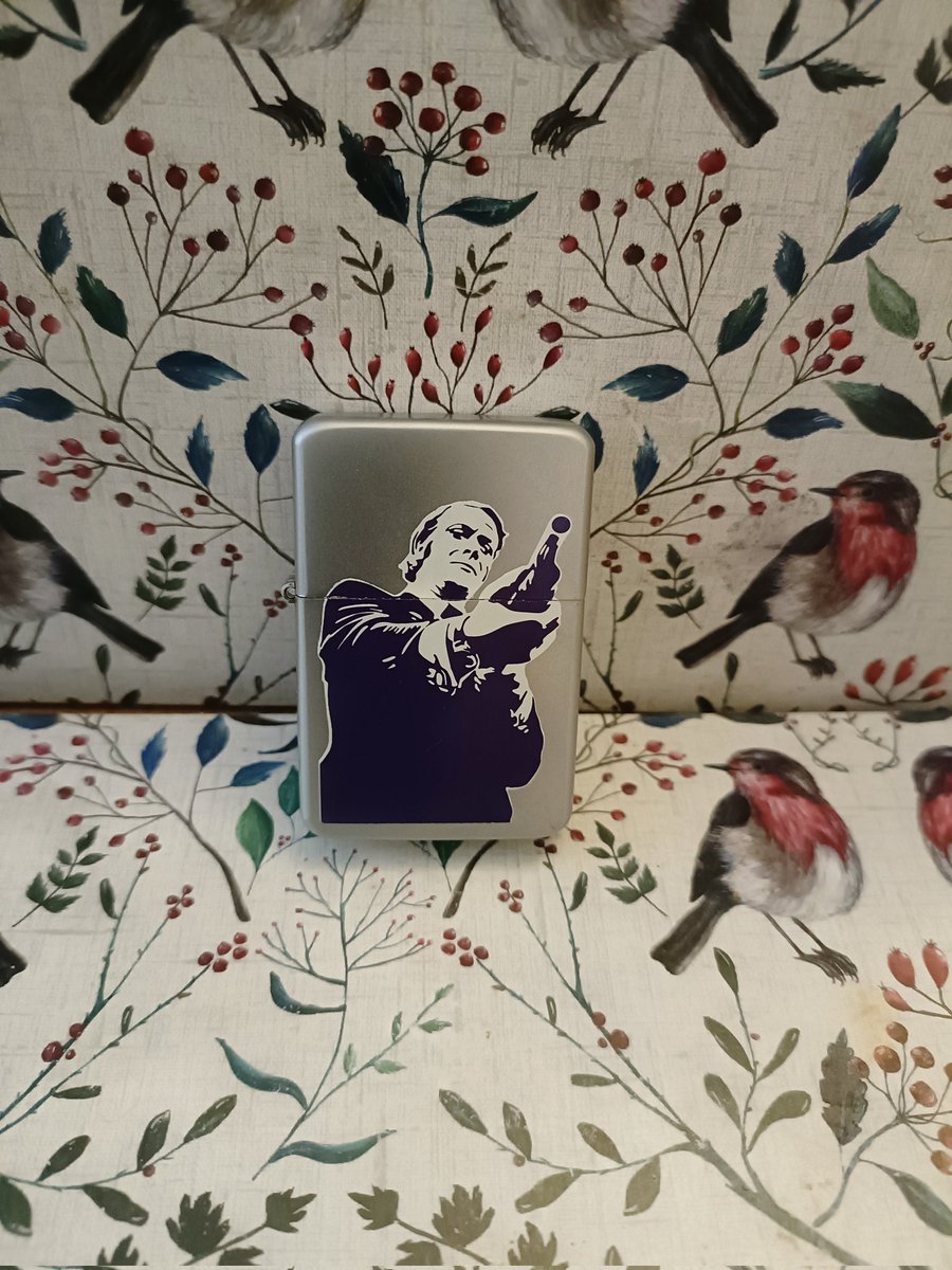 AttheflicksPod's tweet photo. 100 Movie Tie In Items. No.2 Get Carter lighter. 70's Britain - when starring in a tough movie, everyone had to smoke. Although watching the remake could drive you to the same habit. #tiein #getcarter https://t.co/kG9s0o9ixU