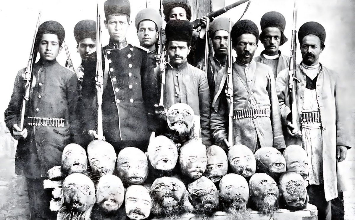 Persians with the heads of Turkmen military commanders, Teheran, 1912