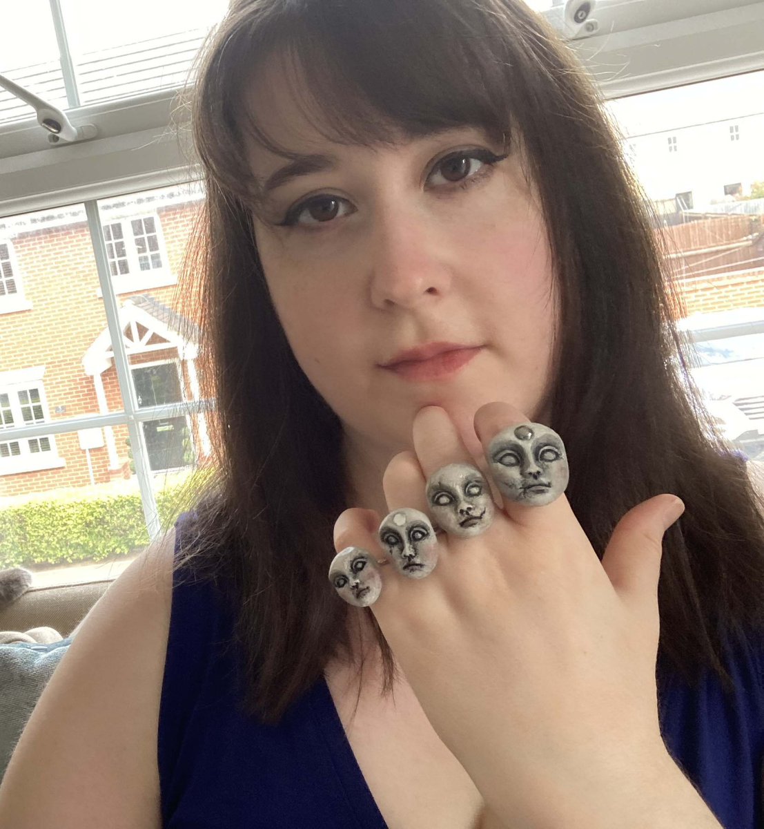 JoannaHartist's tweet photo. Me posing with my hand-sculpted ring faces.
..
#polymerclay #rings #facesculpting #dollface #spiritdolls #statementrings #dolljewellery #crackeddollface #contemporaryartist #autisticartist #artforlife https://t.co/SJRzE4tKcY