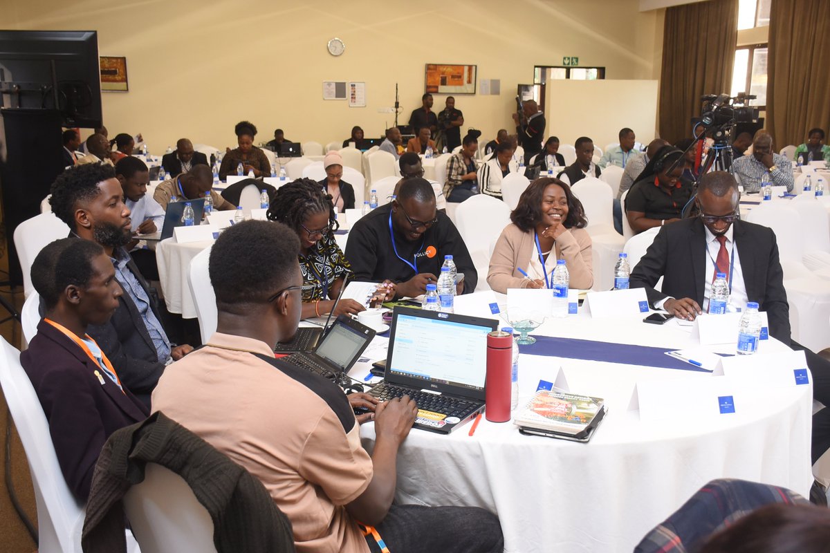 ISOCUg's tweet photo. A cross section of participants and partners take a look at the day's program for our 13th Uganda Internet Governance Forum, currently underway in Kampala, Uganda. The conversations from these engagements will feed into the regional and global IGF. #UIGF #EAIGF #IGF https://t.co/fMdVsY4qAC
