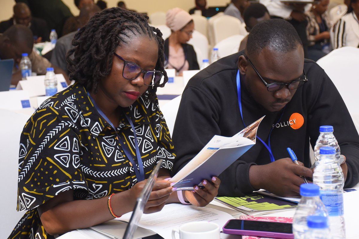 ISOCUg's tweet photo. A cross section of participants and partners take a look at the day's program for our 13th Uganda Internet Governance Forum, currently underway in Kampala, Uganda. The conversations from these engagements will feed into the regional and global IGF. #UIGF #EAIGF #IGF https://t.co/fMdVsY4qAC