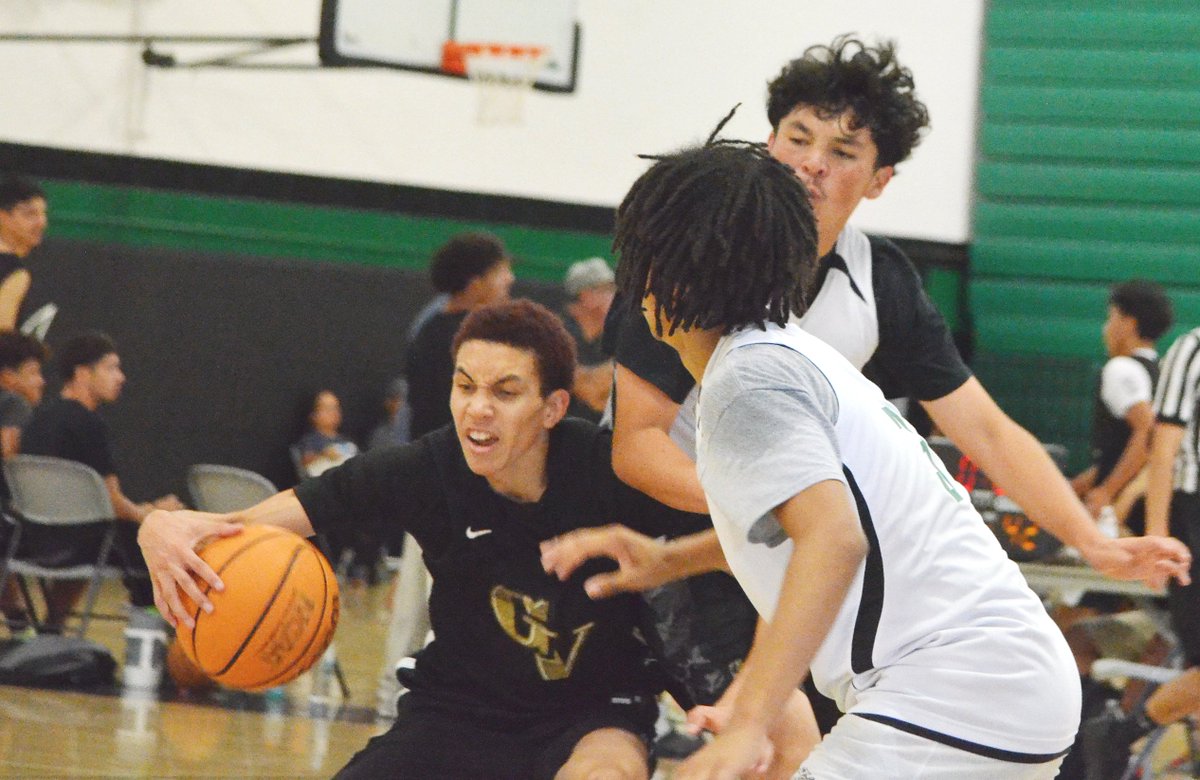 Action from the Summer Clash On The Coast at Pacifica HS in Oxnard. Donovan Webb (Golden Valley) gets pressure from Ethan Thornton (Palmdale) and a teammate. 
<a href="/donwebb_2027/">Donovan Webb</a>