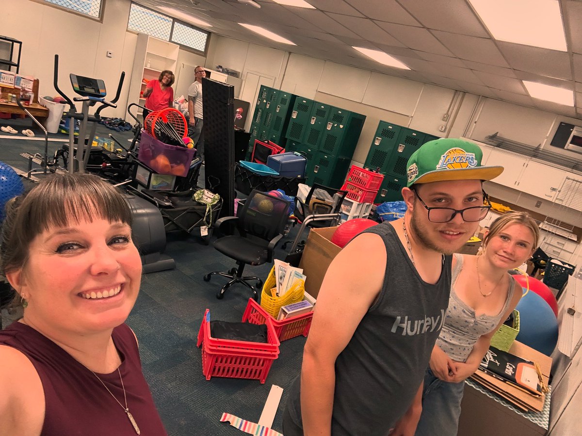 coach_sammi_APE's tweet photo. My crew and I gettin’ sweaty 😅… gotta get this room together! If you need us, we’ll be buried under a piles of equipment and visuals. Send snacks! 🍕📚 #Summer #ClassroomChaos #Organization #MovingClassrooms https://t.co/8ZSLXh6gOH