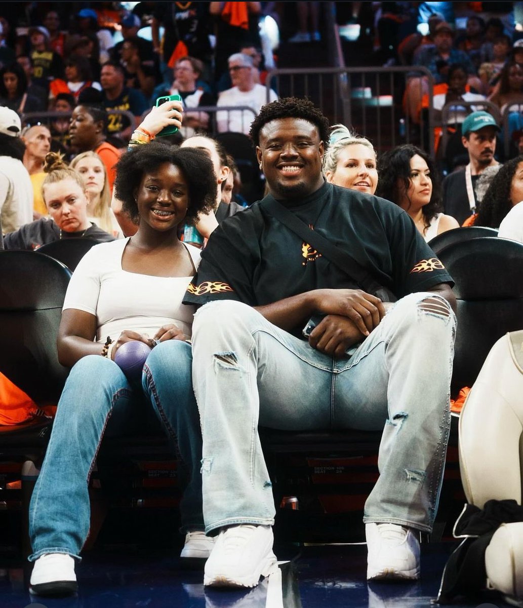 Cory_Mose's tweet photo. Texas Ex Christian Jones having a great time in his new city 

The Arizona Cardinal and his little sister were courtside for the WNBA All-Star game last night 
#HookEm | #Texas https://t.co/4YmpuiCHPL