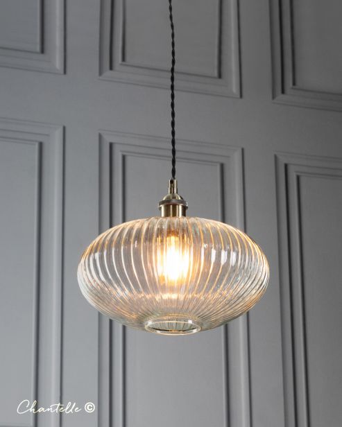 This clear ribbed glass pendant is a beautifully crafted lighting fixture designed to enhance any room with its modern design.

Illuminate your project with this stunning piece today! bit.ly/3VDSRra 

#InteriorDesign #Lighting #ElegantLiving #SophisticatedStyle