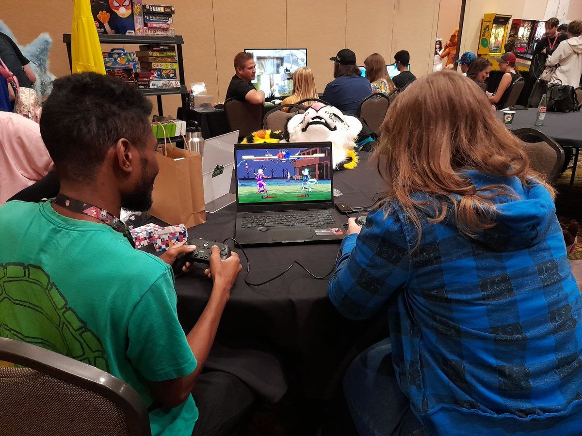 Here's some of the moments we had with play testers and the project lead at <a href="/AnthroWeekendUT/">Anthro Weekend Utah</a> this year! Photos are by <a href="/Tuft_Mouse/">Tuft</a> 
#fightinggames #FGC #gamedev
