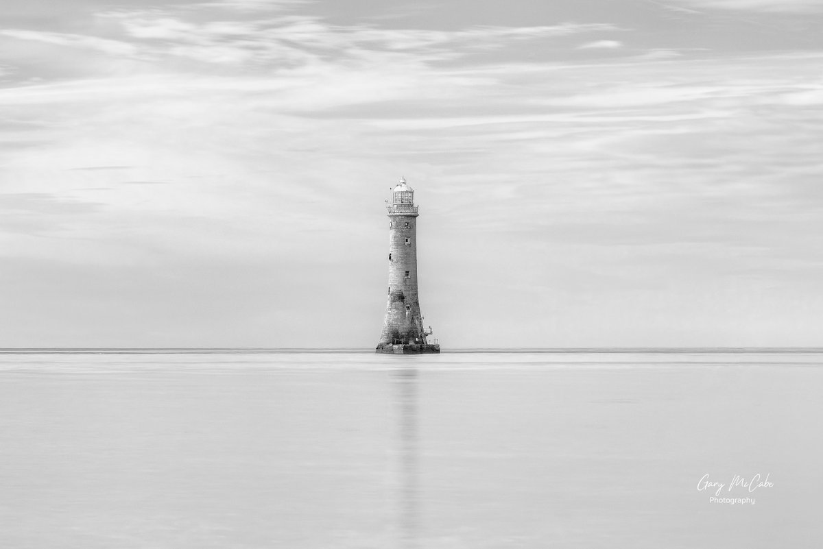 Mount10Photo's tweet photo. Haulbowline.  Haulbowline lighthouse in Carlingford Lough. A high key edit seemed to right for this image. The image breaks the composition rules by placing the focal point directly in the centre, but sometimes it just works. https://t.co/XY50LEBuAu