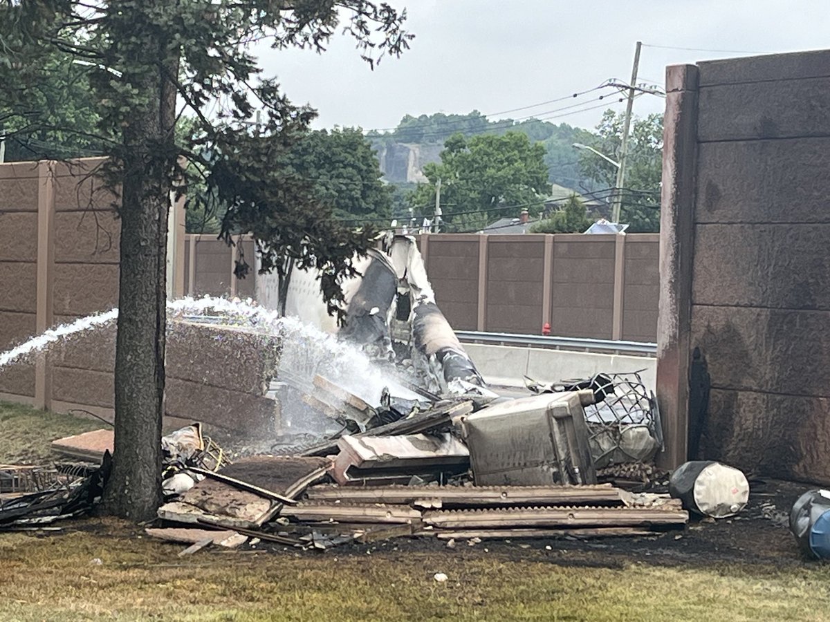 Box truck slams into retaining wall after accident on route three caused huge explosion.  This is all that is left.