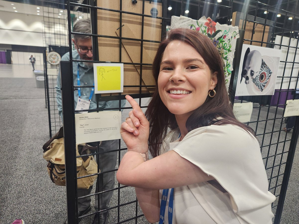 Zoom in on the yellow post-it note for an EERILY accurate drawing of me. Someone tell the artist that they're a sage!!! 

And go check out the awesome #artexhibition at #AAPM2024 !!

pc: @TorTots (and unpictured: the lovely <a href="/LindsayPhys/">MedPhysLindsay</a>)
