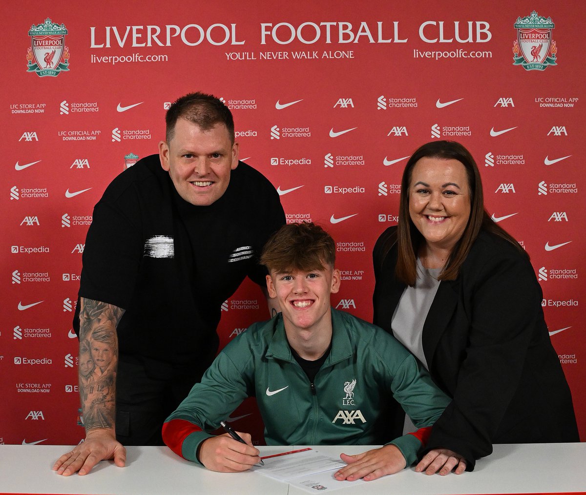 Blg576's tweet image. Very proud moment watching Joe sign his contract for Liverpool. He’s really looking forward to the future as are we. Keep doing us proud son #lfc #liverpoolfc