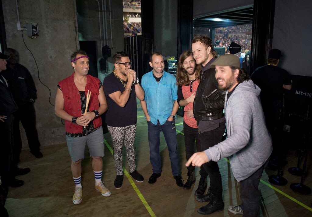 SalVulcano's tweet photo. Eleven years ago, @joe_gatto and I got thrown in front of 14,000 people as one of the opening acts at a sold @imaginedragons show at Jones Beach Theater in Long Island. We don’t play instruments or sing. 

There were already *two* proper opening acts before us. They did NOT want a third. 

We were introduced as “Senora Lanza” (a nod to our high school Spanish teacher) and told to refer to them only as the ImaginATION Dragons, then read an introduction that dedicated the show to the people of Pittsburgh, a much more worthy audience than the folks of Long Island. Then told to “start playing songs”. 

THEY KEPT US OUT THERE FOR 20 MINUTES as the crowd got more and more upset. At one point Joe was told to do a drum solo while I had to do the worm across the stage. Joe just started slamming on the drums yelling “DRUM SOLOOOOOO!!” while I flopped around on the floor. 

Around this time an angry man charged at us from side stage and tried to grab my guitar from my hands. He began cursing and screaming at me. “Give me the guitar! Get off the stage!”  I didn’t know who he was or what he was doing. So I pushed back and kept scrambling to avoid him, yanking back my guitar and dodging around, all while continuing to “play” and “sing”.  

I was then told to stage dive into the crowd. I didn’t want to injure anyone so I proceeded to meekly jump off the stage feet first and we were ushered out as people screamed in our faces as we dodged full cups of soda being thrown. 

I got backstage only to learn that the man trying to take my guitar was the stage manager. Bc I didn’t let him remove me, the concert went past its curfew and into overtime union pay. This is to be avoided at all costs bc the fees then become astronomical. I can’t begin to imagine the extra costs.

I believe the last thing I yelled on the mic was “F the Imagination Dragons”. They were amazing sports about it and just great people for letting us do all of this in the first place. 🙏