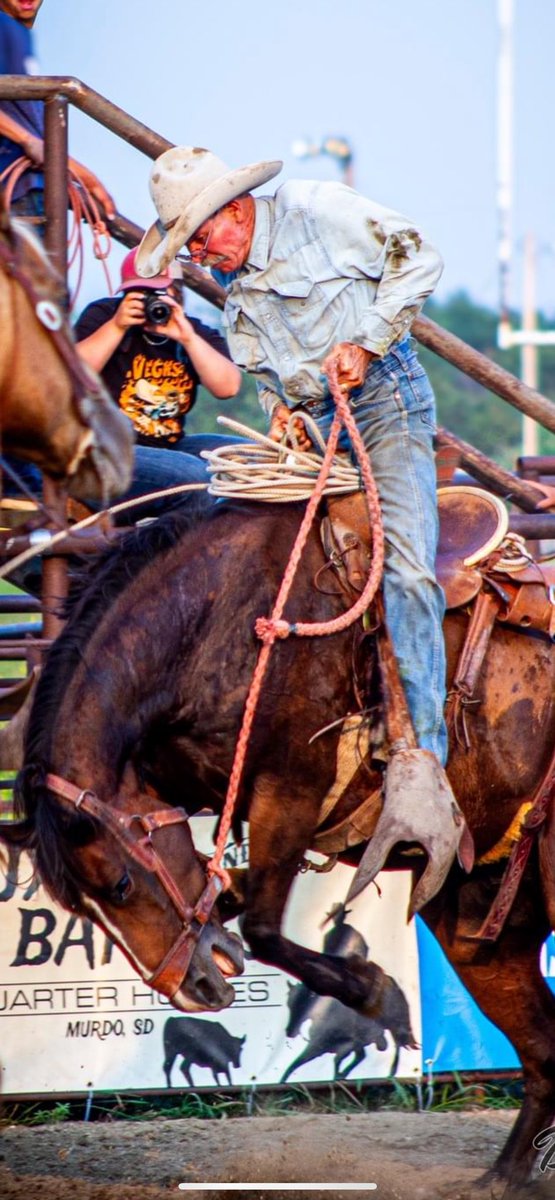 You might think you’re a badass, but you’re not 62 year old South Dakota rancher Ray Chanley riding a bronc with his god damn reading glasses on badass