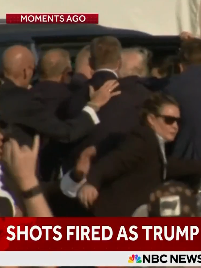 IamVyv's tweet photo. Seeing that rear view of #Donzilla, did anyone notice the glaringly yuge bald patch on the back of its head as it was being shielded and helped off stage at Butler?
Here is a screenshot from the video. I think it is easy to see which one it is, but just in case, it is the 5th from the left.
I reckon that people being able to see that will hurt its vanity and its fragile ego more than the "bullet" did.🤭