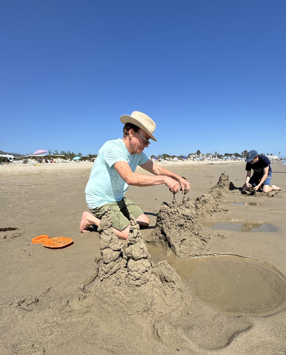 TheTripHawkins's tweet image. Every empire starts in the imagination. As a child, my family and I went often to the beach, where I would build sand castles. I build them still. I’m in the foreground in the vintage family photo; and with my youngest son yesterday #founder #ea #startsmall #dreambig