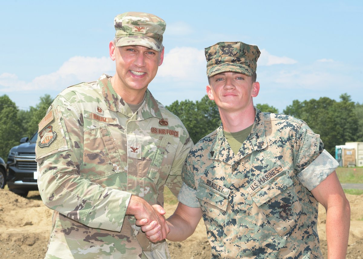 On July 17 Col Jon Baum, 439 MSG/CC coined USMC Cpl. Jake Bradley, Marine Wing Support Squadron 472, and USAF Senior Airmen  Divin Ayaya and Rogerick Pugh, 556th RED HORSE, Fla. ANG for outstanding heavy equipment suppot for a Pad 19 project. @FloridaNationalGuard @usmcreserve