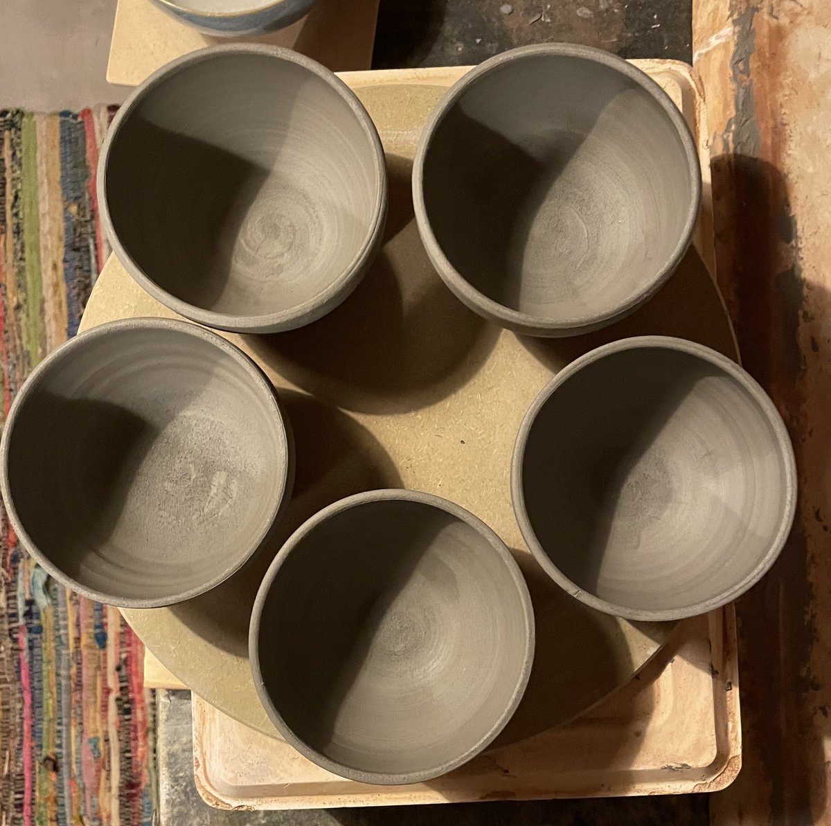 Just_Maths's tweet photo. Day 3 of #boringtweets
Trying to make a dinner set that “matches” this holiday … first up small bowls … they’re “same” enough for us …
Now they just need to survive drying out and 2 firings …
up next dinner plates, side plates and 2 more different sized bowls. https://t.co/vasVPDWUWo