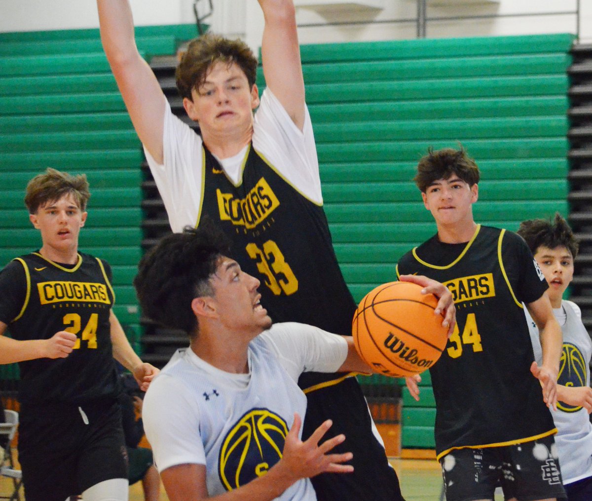 Action from the Pacifica Summer Clash: J.D. Petit (Santa Clara) tries a pump fake on Finn Fancher (Ventura). These two prospects were two of the best we saw on Saturday.