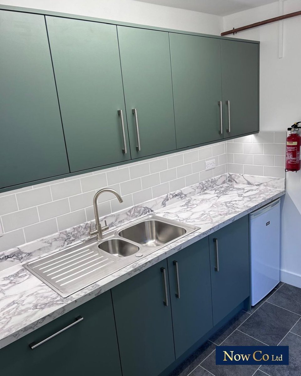 NowCoKitchens's tweet photo. This kitchenette we supplied has been completed by @BILtd_ using Reed Green as previously seen in another recent kitchen of ours, however this time using a slab door rather than shaker style, as well as laminate marble effect worktops all competitively supplied by us 🙌 https://t.co/WRS8ehDQnu