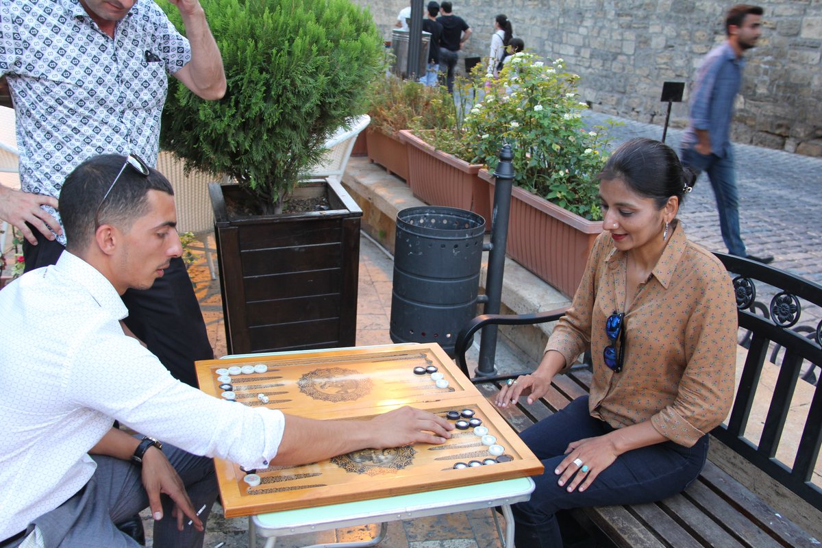 maaria_waseem's tweet image. Learning the traditional Backgammon from a local in #baku #Azerbaijan 
Backgammon is a two-player board game played with counters and dice on tables boards. It is the most widespread family of tables games, whose ancestors date back 5000 yrs to the regions of Mesopotamia &amp;amp;Persia