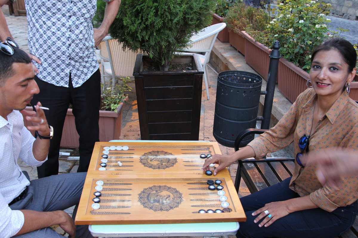 maaria_waseem's tweet image. Learning the traditional Backgammon from a local in #baku #Azerbaijan 
Backgammon is a two-player board game played with counters and dice on tables boards. It is the most widespread family of tables games, whose ancestors date back 5000 yrs to the regions of Mesopotamia &amp;amp;Persia