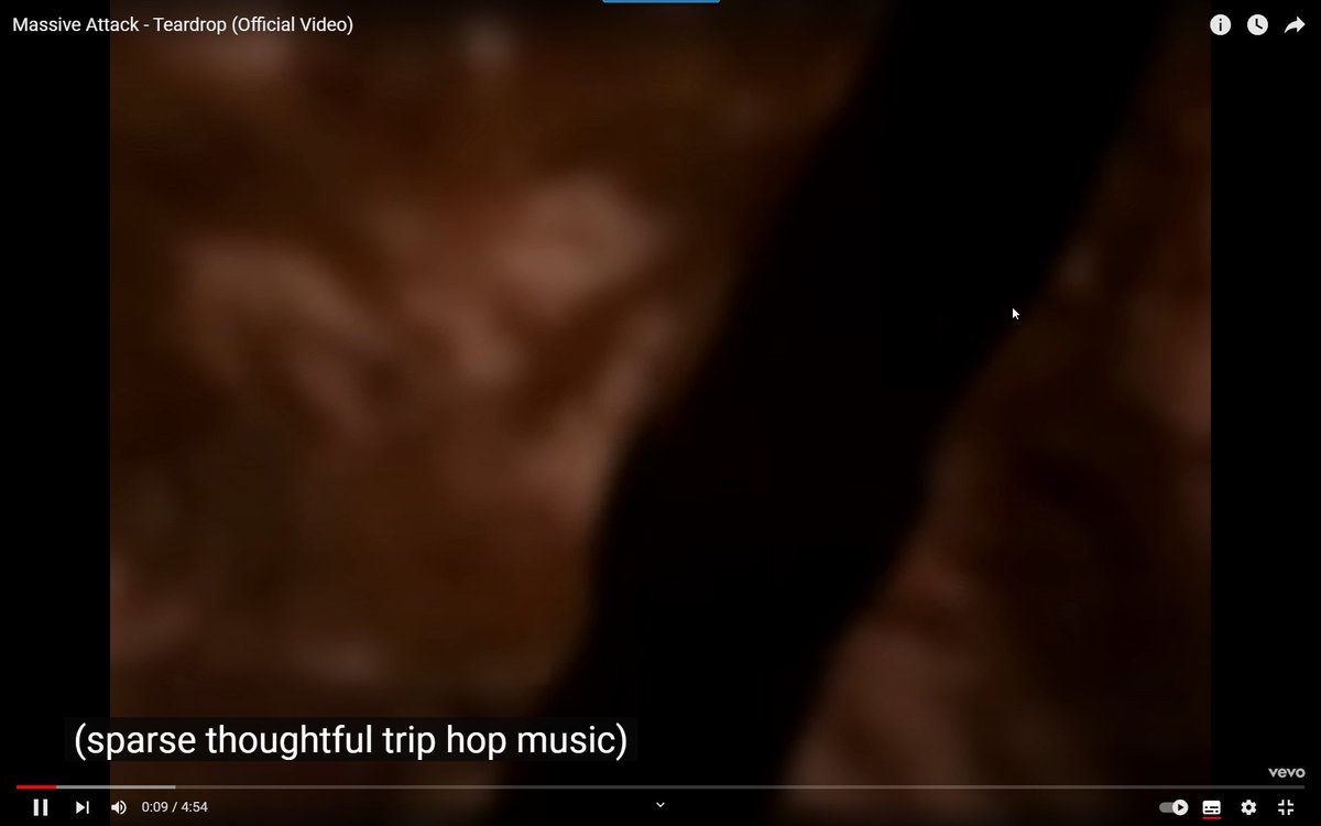 I love <a href="/MassiveAttackUK/">Massive Attack</a> but I realized this morning I don't think I've seen any of their videos before. So I pop up "Teardrop" and the closed captions are on. According to YouTube the intro is "sparce thoughtful trip hop music" :D