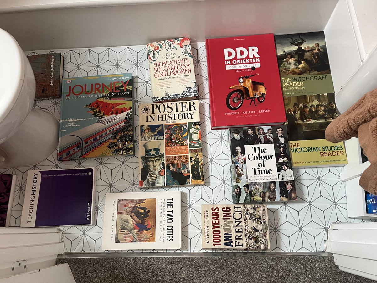 What else do you use to help weigh down vinyl stick-on floor tiles to get them to stick other than history books?! 
<a href="/historybookgrp/">History Teacher Book Club</a>