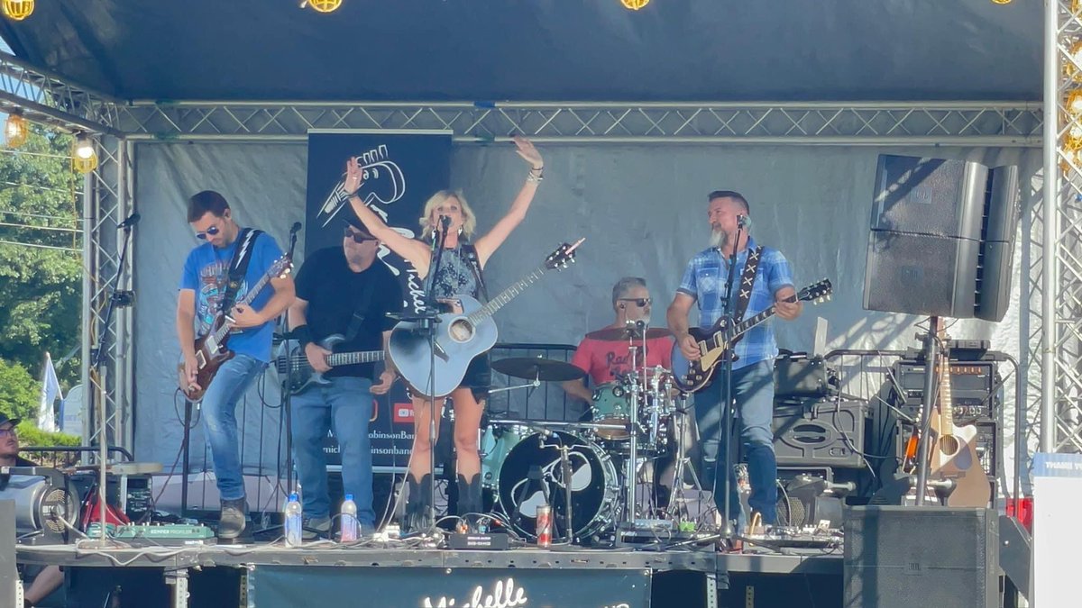 Pahhniwater's tweet photo. Thank you for having Pahhni Water by your side this summer! Let's celebrate @MichelleRobBand's electrifying band. We admire your support for local businesses and the community. Every performance lights up the stage, and we’re here to cool you down as your Hydration Sponsor. https://t.co/HyTmNjqGbG
