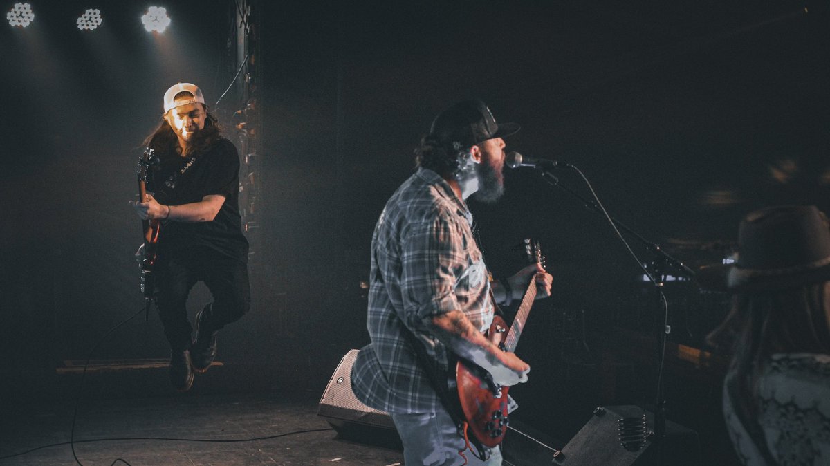 One of my fav pics of all time… Tony Bond caught mid flight on bass!