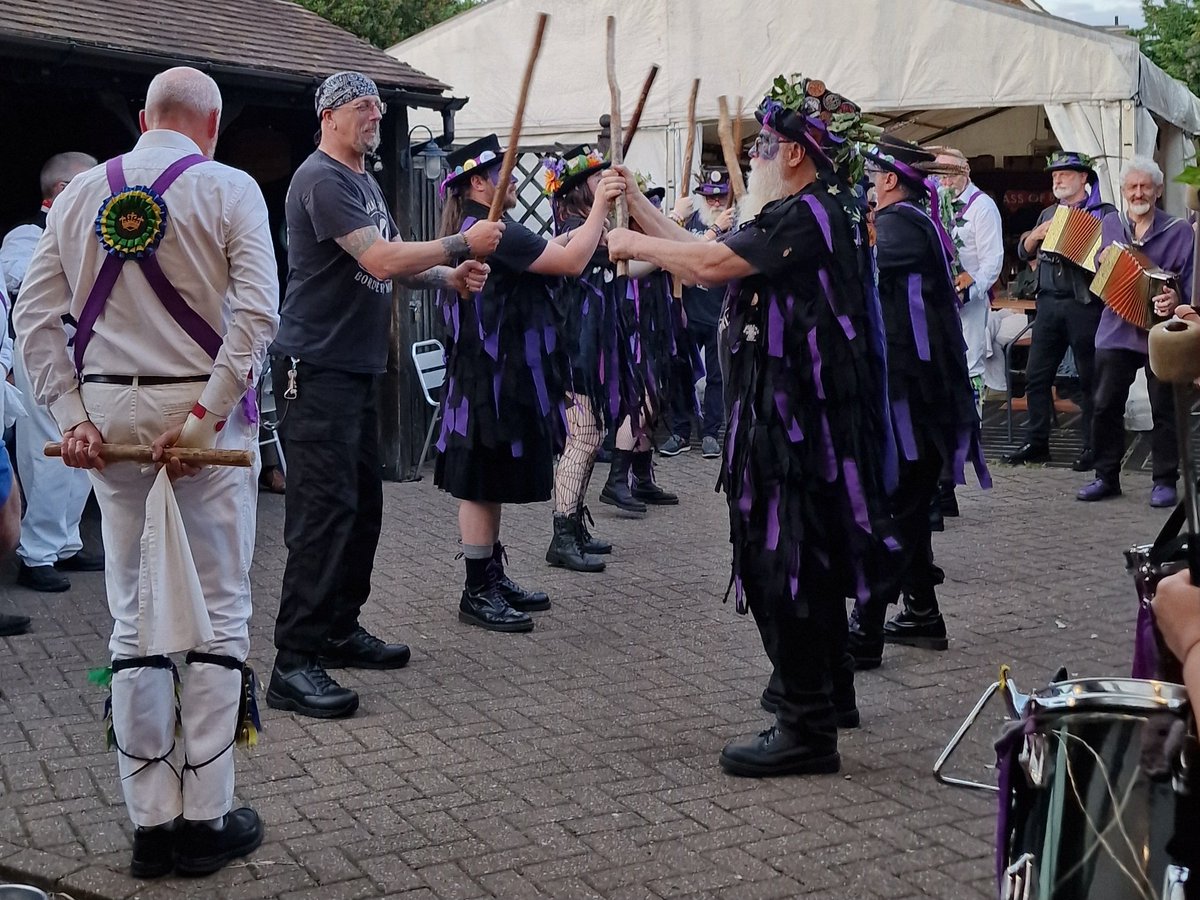 East Surrey Morris Men and Black Swan dancing in Carshalton on Monday.