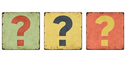 Several question marks; tin sign design. Marilyn Pryle shares the first of 5 Questions teachers can use to help students become more critical readers of any text in any format: "What am I reading?"