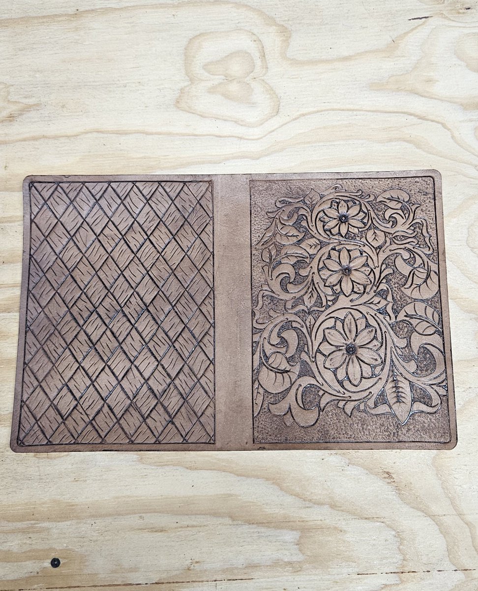 Working on my other hobby. This is a composition notebook cover. The tooling is complete and I applied the antiquing today. Next is to buff it off and do some sewing.