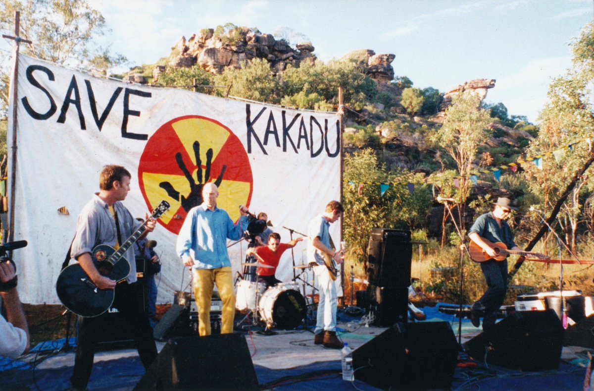 pgarrett's tweet photo. URGENT: Within weeks the Commonwealth & NT Govts must decide whether to renew the Jabiluka Mining Lease.

Back in the 90’s lead by Mirarr Traditional Owners, thousands (including the Oils) gathered @ Jabiluka to protest mining & urge the site be included in Kakadu National Park.

The mining was halted but the lease remains on Aboriginal land. Within the borders of Kakadu, incredibly it includes Madjedbebe - the site of first known human occupation in Australia. 

Traditional Owners and communities are still waiting for Jabiluka to be fully protected. It is now long overdue for Resources Minister King to act.