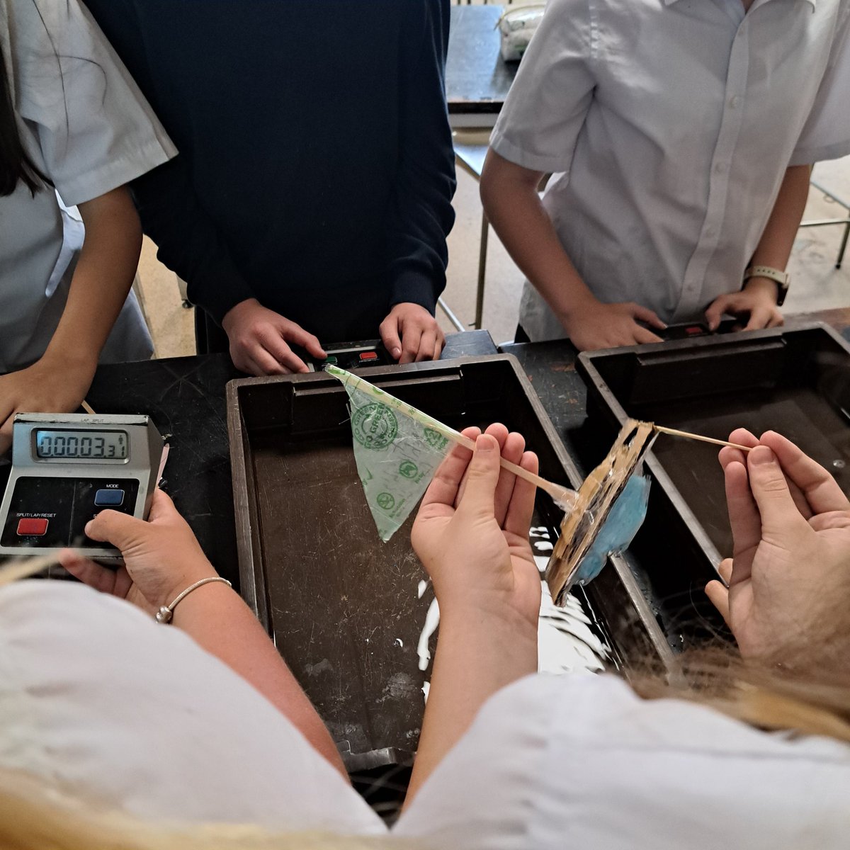 MeceScience's tweet photo. Even during their last lesson, students at MECE are working hard. Year 7, exploring scientific method and racing boats! Year 8 are doing field investigations to work out the population of daisy's on the school field. https://t.co/tTxCI8zfcU