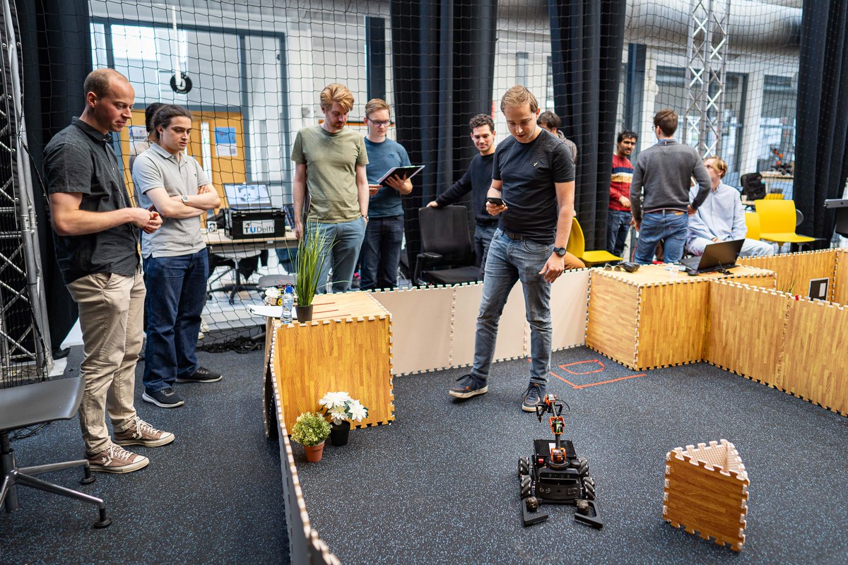 tudelft's tweet photo. 💩 🐮  95 Master Robotics students have been working on a robot that cleans cowsheds. 

The students developed the control software for the robot. It had to avoid cows and other obstacles and navigate itself to places where there is manure. 

👉More: https://t.co/nOhVizZ6ir https://t.co/RGv8u6iQOd