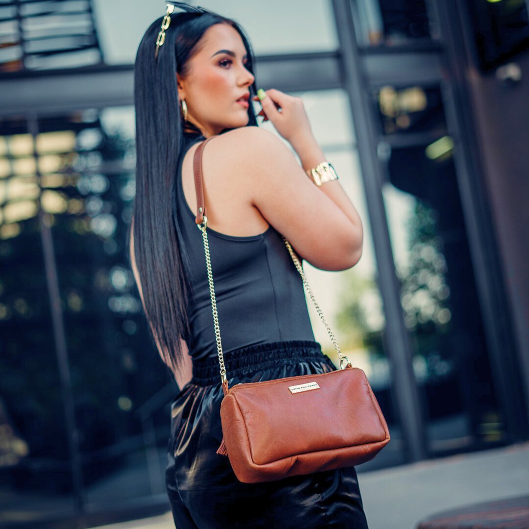 She is classy and elegant and a definite statement piece!
The Chain Block Shoulder Bag is a fan favorite and we can see why!