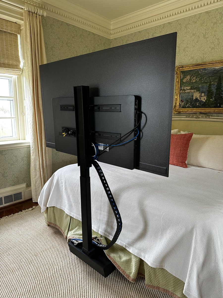 PHA2014's tweet photo. This TV reveals itself from underneath the bedframe and is perfect for streaming movies. #netflix #hulu #movienight #streamingnow #bedroomideas https://t.co/XgjtnKASeS